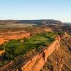 Sand Hollow #13, Par 4, 304 yards: As any drone photo can tell you, left is dead off the edge of this red-rock cliff.