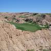 Wolf Creek #2, Par 4, 429 yards: Here we go, so much for simple! Now is the time for a 230 yard forced carry across a landscape where you'd expect to see an anvil falling on a coyote